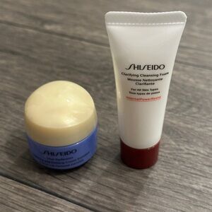 Shiseido Vital Perfection Cream in Blue and Clarifying Cleansing Foam in White